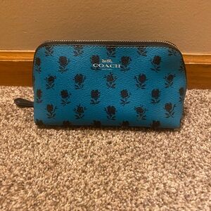 Coach badlands Floral travel pouch